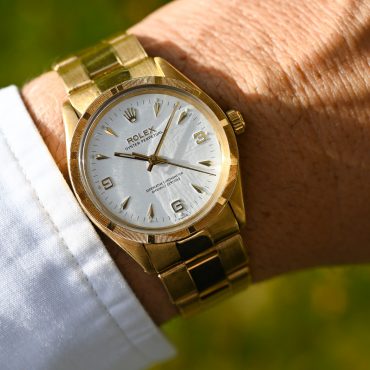 Rolex Oyster Perpetual 6567 in Gelbgold mit 7205 Goldband und Big Logo Schließe