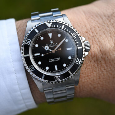 Rolex Submariner 14060 aus 2001 mit Box und Papieren